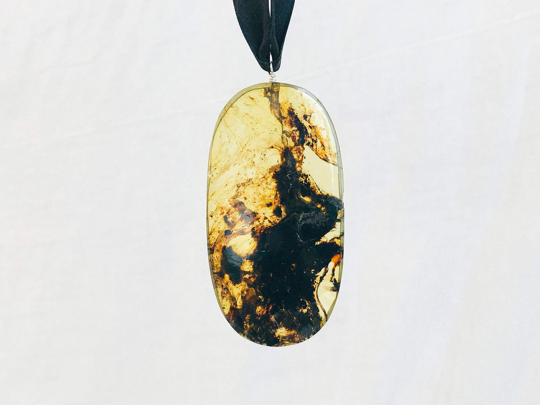 Huge Amber Pendant on a Silk Satin Ribbon.