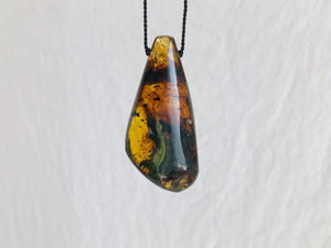 Large Amber Drop Pendant on a Silk Cord