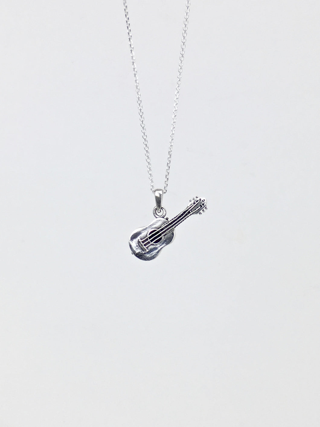 La Guitarrita  sterling silver pendant