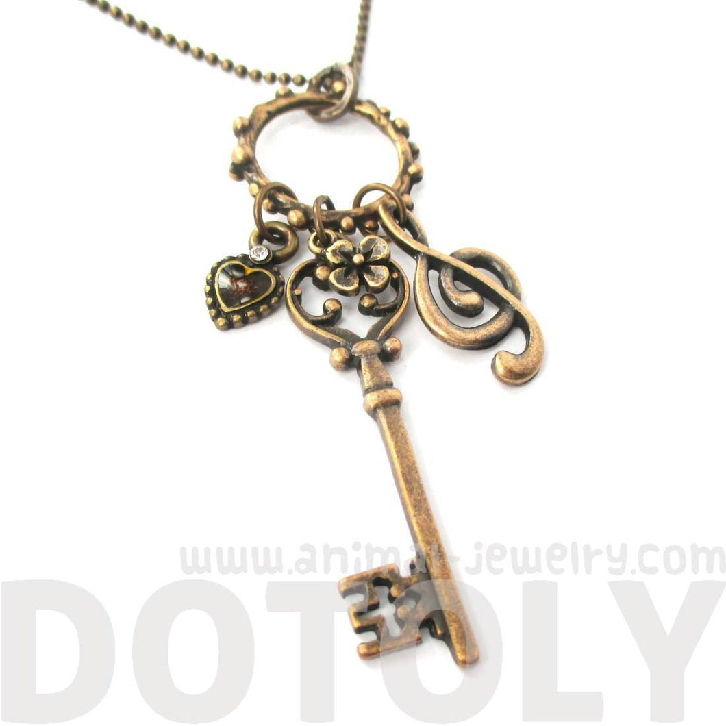 Skeleton Key Heart and Treble Clef Pendant Necklace in Brass | DOTOLY